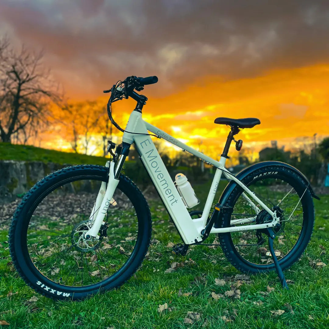E-Movement Thor white hardtail electric bike – genuine manufacturer outdoor lifestyle photograph at sunset