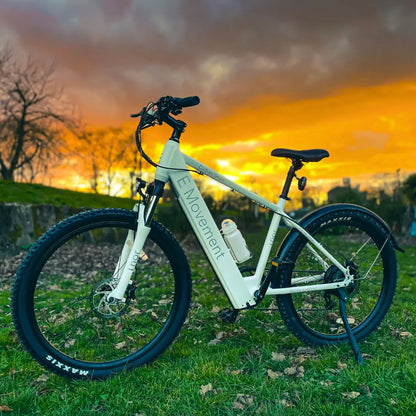 E-Movement Thor white hardtail electric bike – genuine manufacturer outdoor lifestyle photograph at sunset